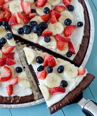 Serving up fruit and brownie dessert pizza
