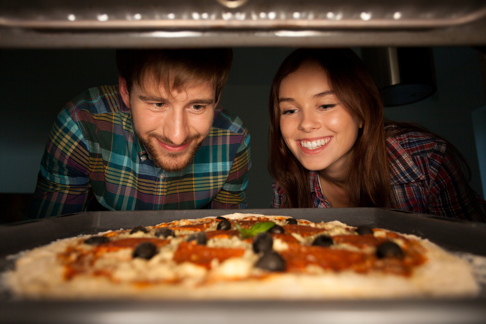 close-up of frozen pizza in oven